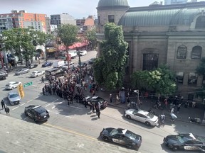 Several Vancouver police officers respond to a disturbance in the Downtown Eastside on Tuesday, Aug. 9, 2022. (Earl Webber/ Submitted)