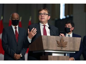 Jonathan Wilkinson, Canada's natural resources minister, speaks during a news conference in Ottawa, Ontario, Canada, on Tuesday, Oct. 26, 2021. Prime Minister Justin Trudeau unveiled a new cabinet that puts an environmental activist in charge of climate policy, while shuffling other key posts in a bid by the Canadian prime minister to breathe new life into an administration entering its seventh year in power.