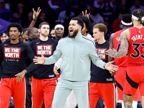 Fred VanVleet #23 of the Toronto Raptors (C) celebrates in the fourth quarter against the Philadelphia 76ers during Game Five of the Eastern Conference First Round at Wells Fargo Center on April 25, 2022 in Philadelphia, Pennsylvania. (Photo by Tim Nwachukwu/Getty Images)