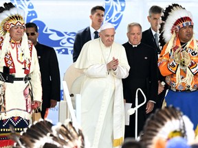 Many residential school survivors and others expressed their respect to the Pope for bringing his apologies to North America.  Yet another cohort of Canadians was decidedly unimpressed.  What is the future of reconciliation now?  (Pope Francis speaks with members of the indigenous community at Muskwa Park in Maskwacis, Alberta, Canada, on July 25, 2022.)