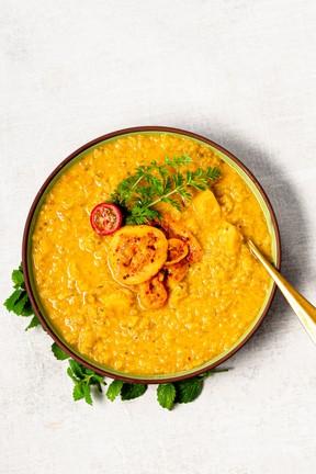 Squash and Red Lentil Curry is a mild curry that can go with rice, roasted cauliflower, chutney or even a pickle.