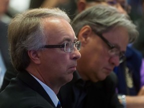 B.C. Minister of Aboriginal Relations and Reconciliation John Rustad, left, looks on during a gathering of First Nations leaders and B.C. cabinet ministers in Vancouver on September 10, 2015. British Columbia MLA John Rustad says he has no animosity toward the BC Liberal Party after being ousted from its caucus earlier this week.