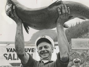 Aug. 20, 1967. Top fisherman in the Sun's Centennial Salmon Derby, David Chafe, hoists trophy high in victory salute on weigh-in at Horseshoe Bay Sunday. Chafe's 37 pound chinook won him 17-foot Hourston Glascraft boat with 80-horsepower outboard motor.