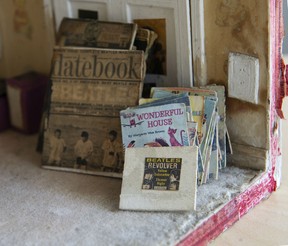 The records and magazines in the Beatles diorama were probably cut from magazines with an exact knife.