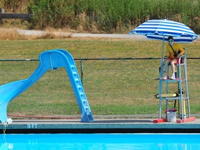 Lifeguard in action at New Brighton Park Pool as a shortage lifeguards have forced the closures of some pools in Vancouver, BC., on August 1, 2022.
