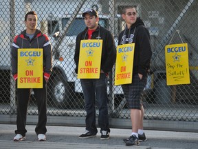 Government workers hold a one-day strike at the LCB warehouse on East Broadway in Vancouver on September 5, 2012.