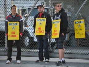 Government workers conduct a one-day strike at the LCB warehouse on East Broadway in Vancouver on Sept. 5, 2012.