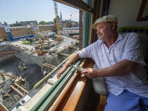 Karl Prevost at his home inside the Lee Building at Main and East Broadway. Noise all day and night coming from the Broadway Line SkyTrain construction has residents upset.