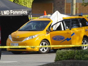 A man was shot dead in a taxicab at a strip mall on 108th Avenue near 148 Street in Surrey on Aug. 9, 2022.