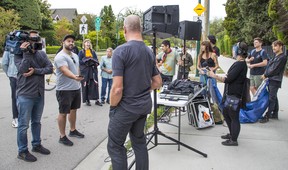 Chip Wilson talking to protesters in front of his house in 2019.