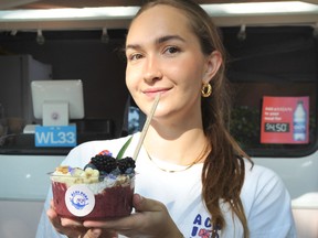 Bailey Marshall of Acai Dude with the Smoothie Bowl during a media event to promote the new dishes available this year at the PNE in Vancouver, BC., on August 24, 2022.