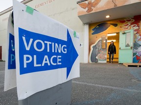 People vote at Grandview school during the municipal election in Vancouver on Oct. 20, 2018.