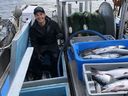 Kris Dudoward is shown aboard the commercial fishing vessel Irenda earlier this week with catch of sockeye salmon on B.C.'s Skeena River near Prince Rupert.