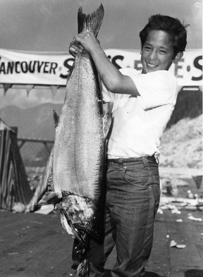 Rennie Marr, 13, won second prize in the 1957 Vancouver Sun Salmon Derby with this 29-pound monster king salmon just minutes after starting to fish. Photo ran July 25, 1958. Brian Kent/Vancouver Sun