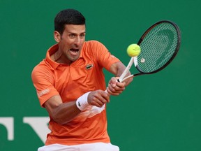 Tennis - ATP Masters 1000 - Monte Carlo Masters - Monte-Carlo Country Club, Roquebrune-Cap-Martin, France - April 12, 2022. Serbia's Novak Djokovic in action during his second round match against Spain's Alejandro Davidovich Fokina.