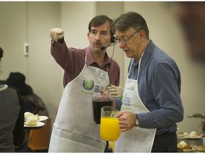 Dan Russell of the UGM (left), seen during one of the agency's annual Thanksgiving dinners, says that after three years of effort and delays, it is finally getting close to getting government registration of one of the three UGM-run recovery houses.