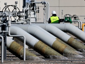 FILE PHOTO: Pipes at the landfall facilities of the 'Nord Stream 1' gas pipeline are pictured in Lubmin, Germany, March 8, 2022