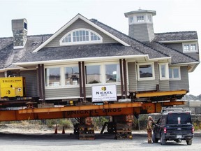 A large house and garage rests at Rock Bay after a move by Nickel Bros. on Friday, Augl 19, 2022. DARREN STONE, TIMES COLONIST