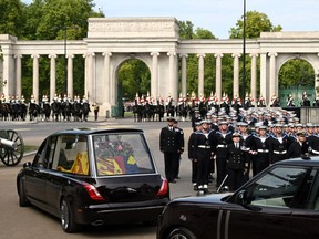The Royal Hearse carrying the coffin of Queen Elizabeth II at Wellington Arch on September 19, 2022 in London, England.