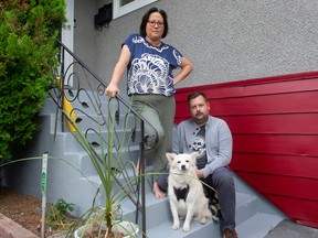 Adrienne Gee and her husband Curtis Rowe, with their dog Skeye, at their Vancouver home just south of the PNE grounds on Sept. 28. They say noise from an increasing number of concerts at the PNE amphitheatre are bothersome to the neighbourhood and are hoping for consultation with PNE management to come up with a plan to minimize the noise for residents.
