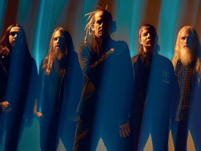 Lamb of God is releasing Omens in 2022. Singer Randy Blythe, middle with braids, has become involved in Ecuadorean reforestation projects.