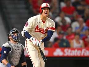 Shohei Ohtani #17 of the Los Angeles Angels yells after hitting a foul ball in the fifth inning against the Seattle Mariners at Angel Stadium of Anaheim on September 16, 2022 in Anaheim, California.