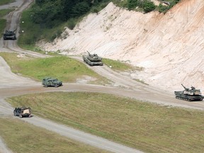 In this handout image released by the South Korean Defense Ministry, South Korean and U.S. soldiers take part in a joint military exercise at the Rodriguez Live Fire Complex on August 31, 2022 in Pocheon, South Korea.