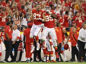 Chris Jones (#95) of the Kansas City Chiefs celebrates a sack with Travis Kelce (#87) during the third quarter against the Los Angeles Chargers at Arrowhead Stadium on Sept. 15, 2022 in Kansas City, Missouri.