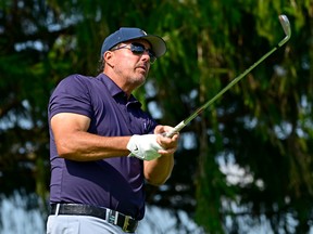 Team Captain Phil Mickelson of Hy Flyers GC plays his shot on the third tee during Day One of the LIV Golf Invitational - Chicago at Rich Harvest Farms on September 16, 2022 in Sugar Grove, Illinois.