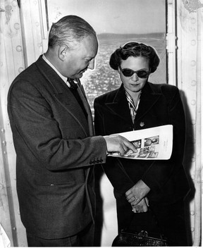 September 1952. “Dr. and Mrs. Max Stern returned this week in the Empress of Canada from a three months trip to England, France, Germany, Switzerland and Italy.” But as this photograph, taken before their departure, makes clear, it was no ordinary trip. Stern, a pioneering Montreal gallery owner, was on a mission to find paintings stolen from his family’s gallery in Duesseldorf, Germany, by the Nazis. In the uncredited photo, Stern and his wife Iris are looking at reproductions of some of the missing paintings. During the trip, they located one work: Judgment Day by 15th century master Hieronymus Bosch. “Another — St. Anthony — by an unknown 15th-century painter, is being contested by Hamburg law courts,” the caption said.