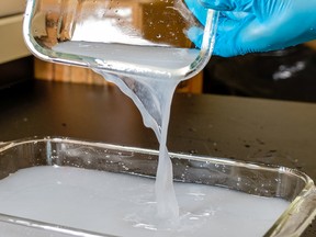UBC researcher Dr. Feng Jiang has developed a cellulose film from wood pulp that is strong and biodegradable. Photo credit: Paulo Ramos – UBC Faculty of Forestry.