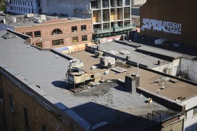 Fire damage can be seen on the roof the Keefer Rooms building in Vancouver, September 10, 2022.