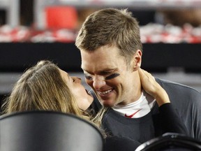 NFL Football - Super Bowl LV - Tampa Bay Buccaneers v Kansas City Chiefs - Raymond James Stadium, Tampa, Florida, U.S. - February 7, 2021 Tampa Bay Buccaneers' Tom Brady and his wife Gisele Bundchen celebrate after winning the Super Bowl LV.