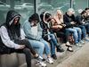 People lined up outside of the Passport Canada office in downtown Toronto, April 25, 2022.