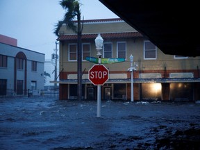 A flooded street in Fort Myers, Florida, as Hurricane Ian makes landfall on September 28, 2022. REUTERS/Marco Bello