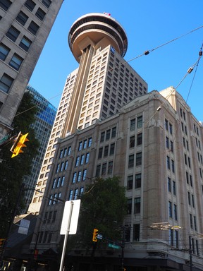 The 1926 David Spencer department store (foreground) is now part of the Harbour Centre complex at 555 West Hastings St., which includes a 28-storey tower (background). Both buildings are partly used as data centres.