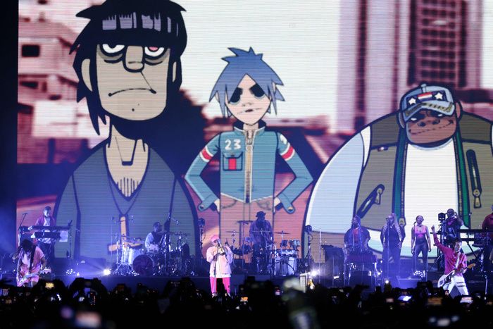 Yasiin Bey and Damon Albarn of Gorillaz perform on stage at All