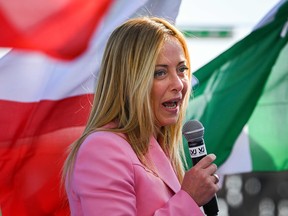 Leader of Italian far-right party 'Fratelli d'Italia' (Brothers of Italy), Giorgia Meloni delivers a speech on Sept. 23, 2022 in the city of Naples.