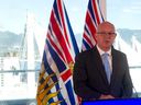 B.C. Solicitor-General Mike Farnworth speaks at a media conference in the provincial government's Canada Place offices on Sept. 21, 2022, to announce a plan to target prolific offenders, particularly those committing property crimes and random physical attacks.