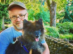 Grant Hayter-Menzies, here with dog Freddie, hasn't been able to find a family doctor since he moved to Vancouver Island.