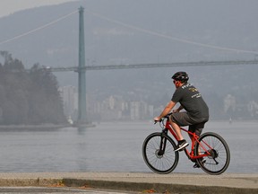 Smoky conditions remain over Metro Vancouver Thursday, but some relief is expected with Friday's rain.
