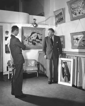Max Stern with an Emily Carr painting at the Dominion gallery. Courtesy Concordia University.