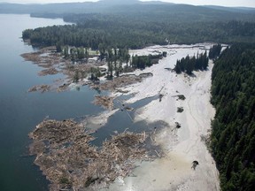 A aerial view shows the debris going into Quesnel Lake caused by a tailings pond breach in August of 2014.