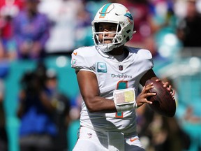Miami Dolphins quarterback Tua Tagovailoa attempts a pass against the Buffalo Bills during their Sept. 25, 2022 National Football League game at Hard Rock Stadium in Miami Gardens, Fla.