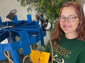Madeline Clarke, 18, is a second-year engineering student at UNBC. She has designed and created a rotating indoor air quality detector that can take up to 12 different samples at a time. Photo: Michelle Cyr-Whiting, UNBC.