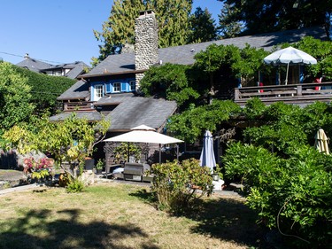 Vancouver, BC: September 20, 2022 -- Log house at 4686 W. 2nd in Vancouver, BC Tuesday, September 20, 2022. The house was built in 1912 and sits on three lots. It is for sale for $16-million.

(Photo by Jason Payne/ PNG)
(For story by John Mackie) [PNG Merlin Archive]