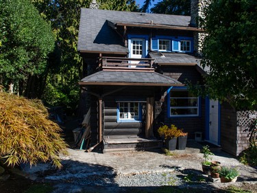 Vancouver, BC: September 20, 2022 -- Log house at 4686 W. 2nd in Vancouver, BC Tuesday, September 20, 2022. The house was built in 1912 and sits on three lots. It is for sale for $16-million.

(Photo by Jason Payne/ PNG)
(For story by John Mackie) [PNG Merlin Archive]