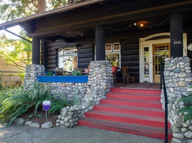 Vancouver, BC: September 20, 2022 -- Log house at 4686 W. 2nd in Vancouver, BC Tuesday, September 20, 2022. The house was built in 1912 and sits on three lots. It is for sale for $16-million.

(Photo by Jason Payne/ PNG)
(For story by John Mackie) [PNG Merlin Archive]