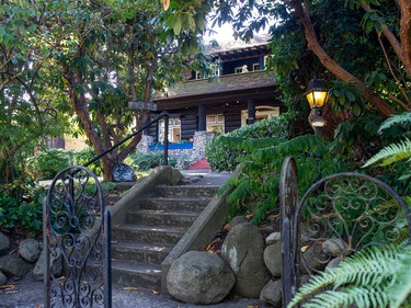 Vancouver, BC: September 20, 2022 -- Log house at 4686 W. 2nd in Vancouver, BC Tuesday, September 20, 2022. The house was built in 1912 and sits on three lots. It is for sale for $16-million.

(Photo by Jason Payne/ PNG)
(For story by John Mackie) [PNG Merlin Archive]