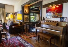 The living room is big enough for a piano.